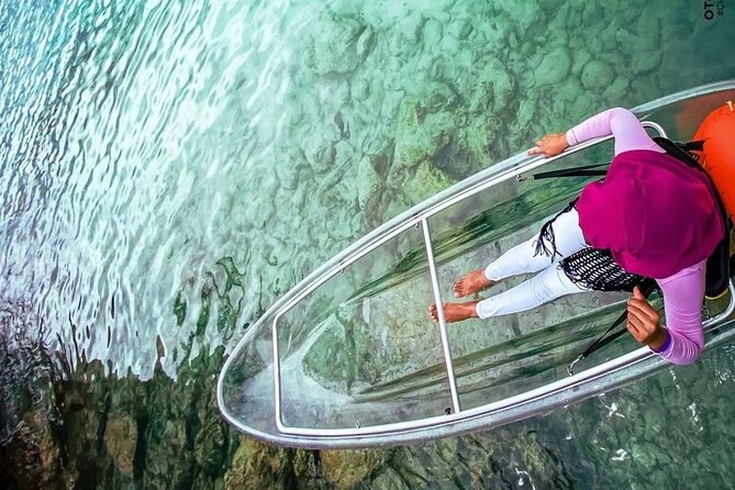 Clear Kayaking in Tobago - Getting settled in the clear boats