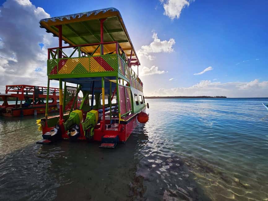 Tobago: Coral Reef Boat Tour with BBQ and Transfer - Starting at Buccoo Beach with a glass-bottom view
